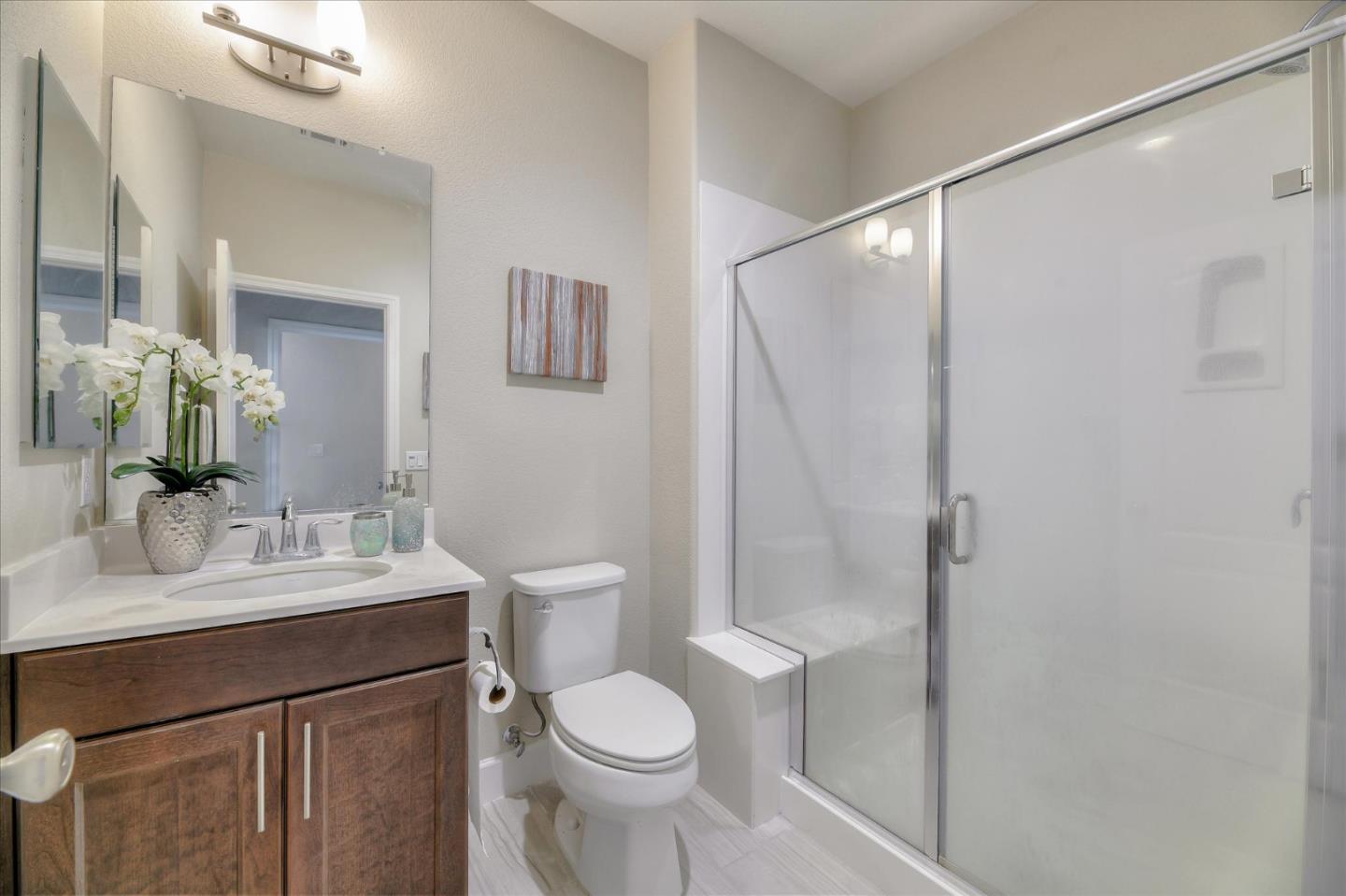 131 Hudson Place San Jose, CA 95123 - Photo 13 of 16 a bathroom with a sink and a mirror