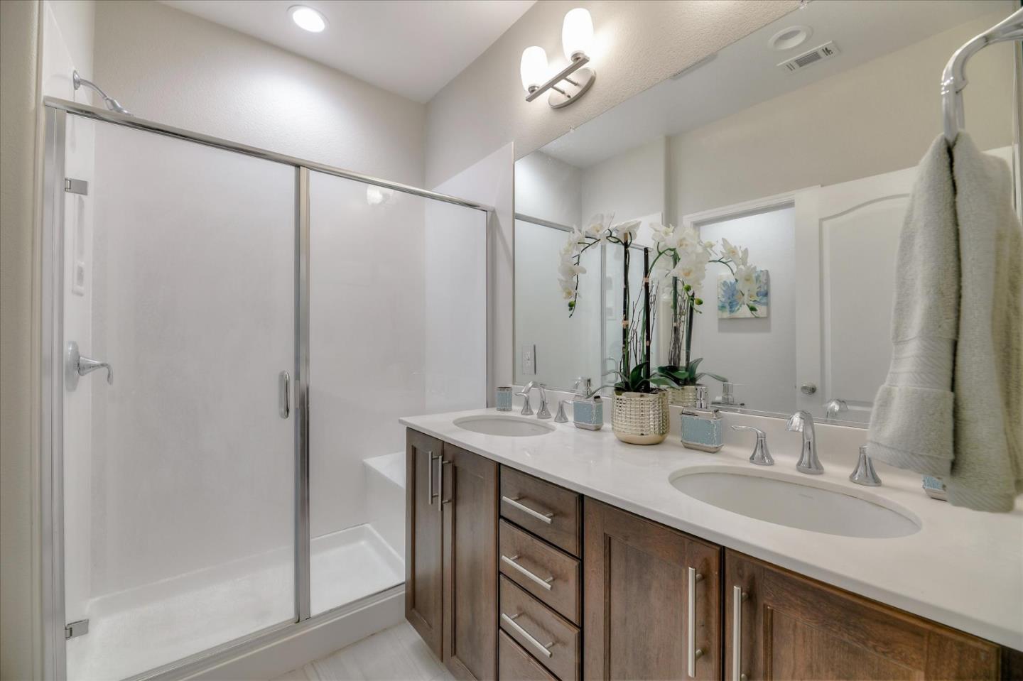 131 Hudson Place San Jose, CA 95123 - Photo 14 of 16 a bathroom with a double vanity sink mirror and double