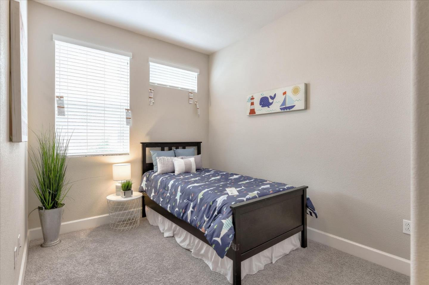131 Hudson Place San Jose, CA 95123 - Photo 9 of 16 a bedroom with a bed and a potted plant