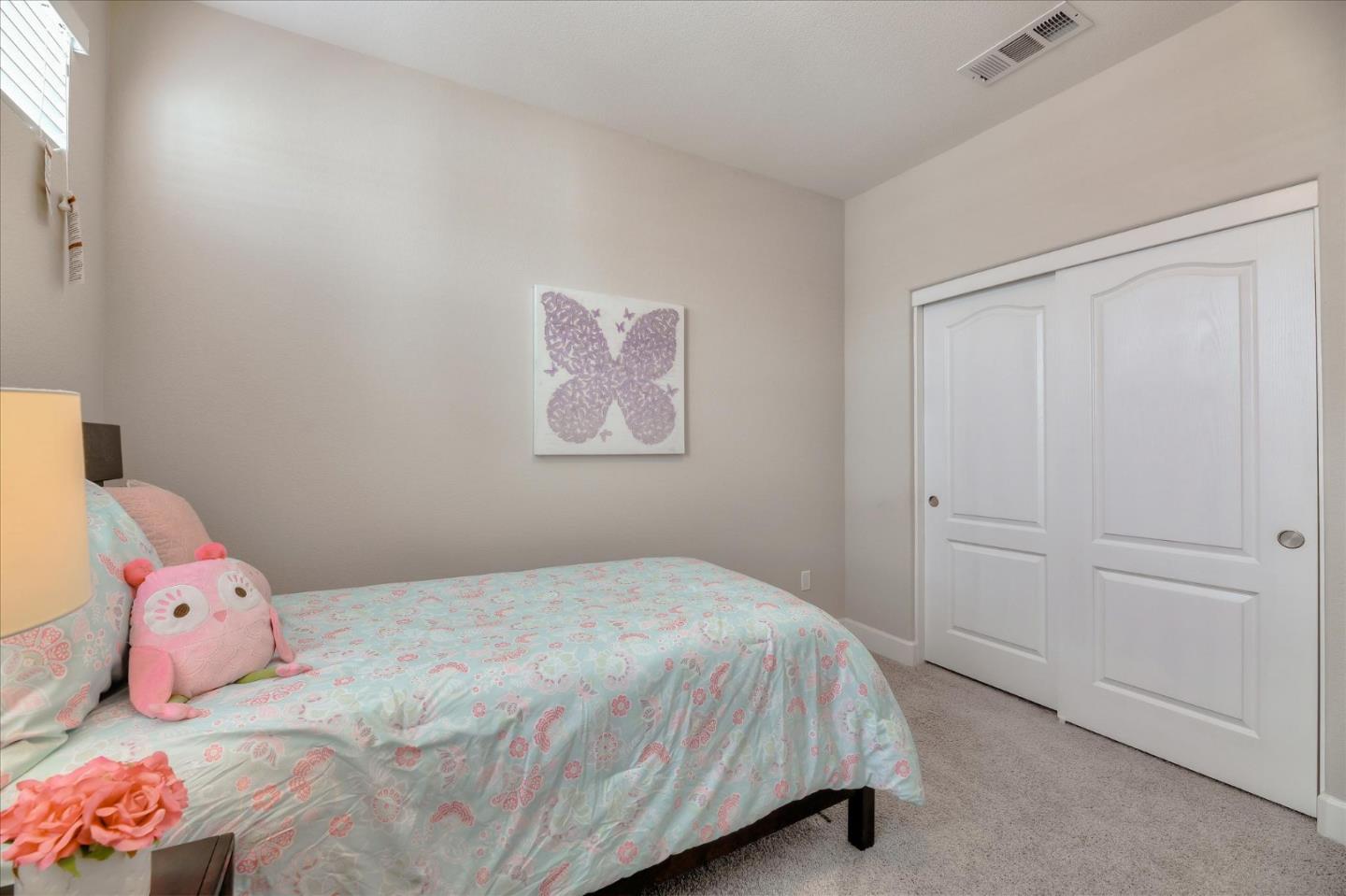 131 Hudson Place San Jose, CA 95123 - Photo 10 of 16 a bedroom with a bed and a closet