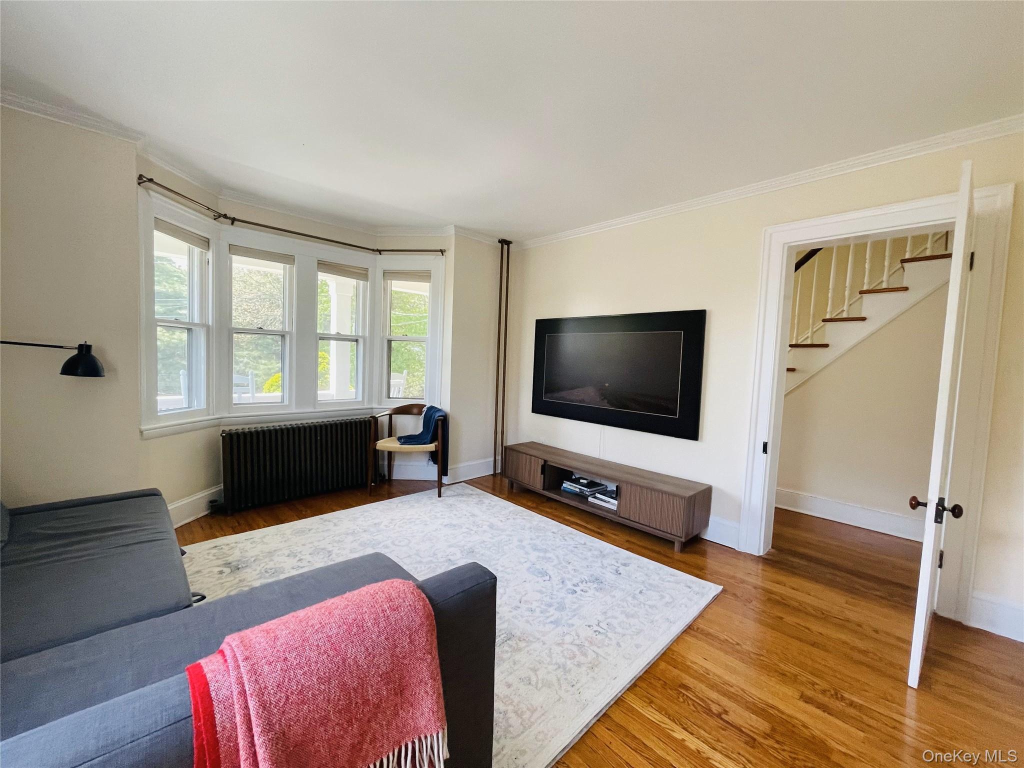 12 Parrott Street Cold Spring, NY 10516 - Photo 8 of 18 Living room featuring doors that close