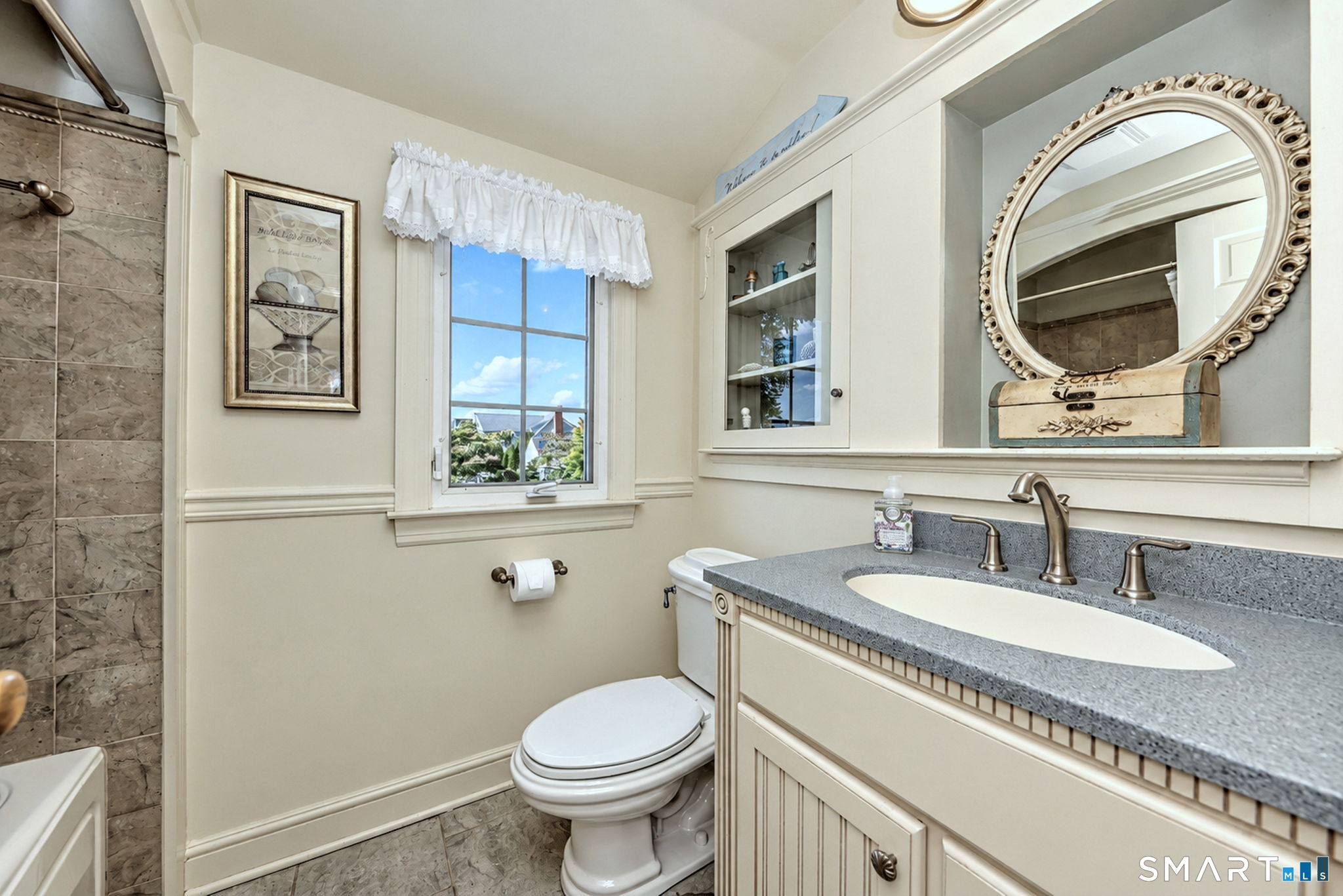 376 Stratford Road Stratford, CT 06615 - Photo 30 of 40 Hall Bath: Beautiful Tilework and Built-In Cabinetry.