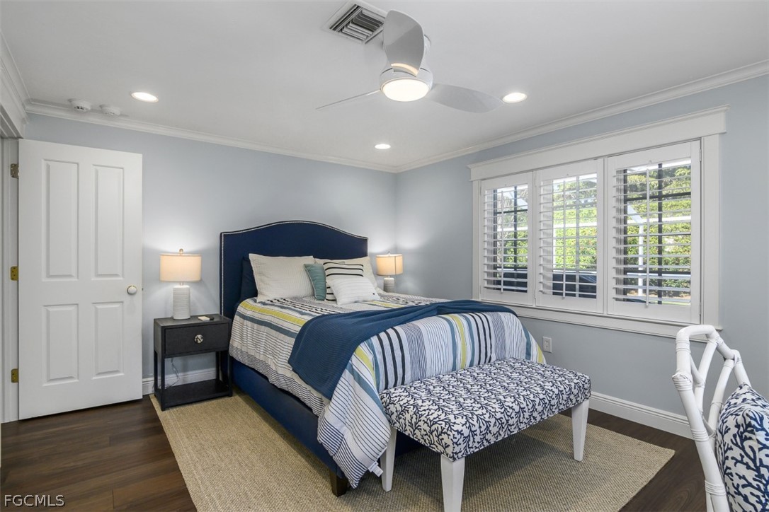 549 7th Avenue North Naples, FL 34102 - Photo 11 of 19 a bedroom with bed and window