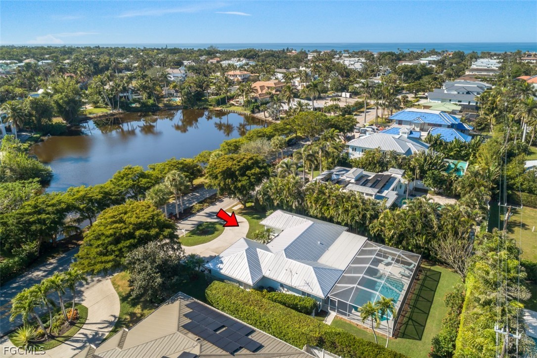 549 7th Avenue North Naples, FL 34102 - Photo 3 of 19 an aerial view of residential houses with outdoor space and river