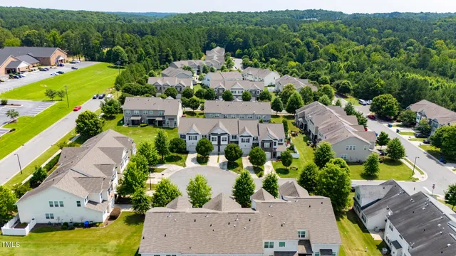 an aerial view of a house with a garden