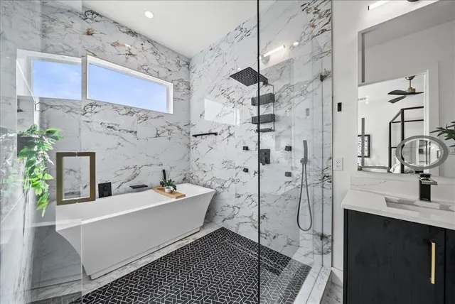a bathroom with a double vanity sink and a mirror