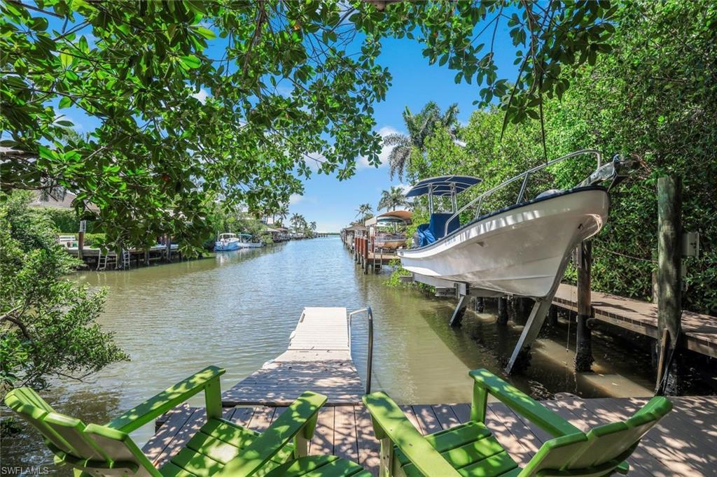401 Panay Avenue Naples, FL 34113 - Photo 37 of 41 Rear Yard toward Canal