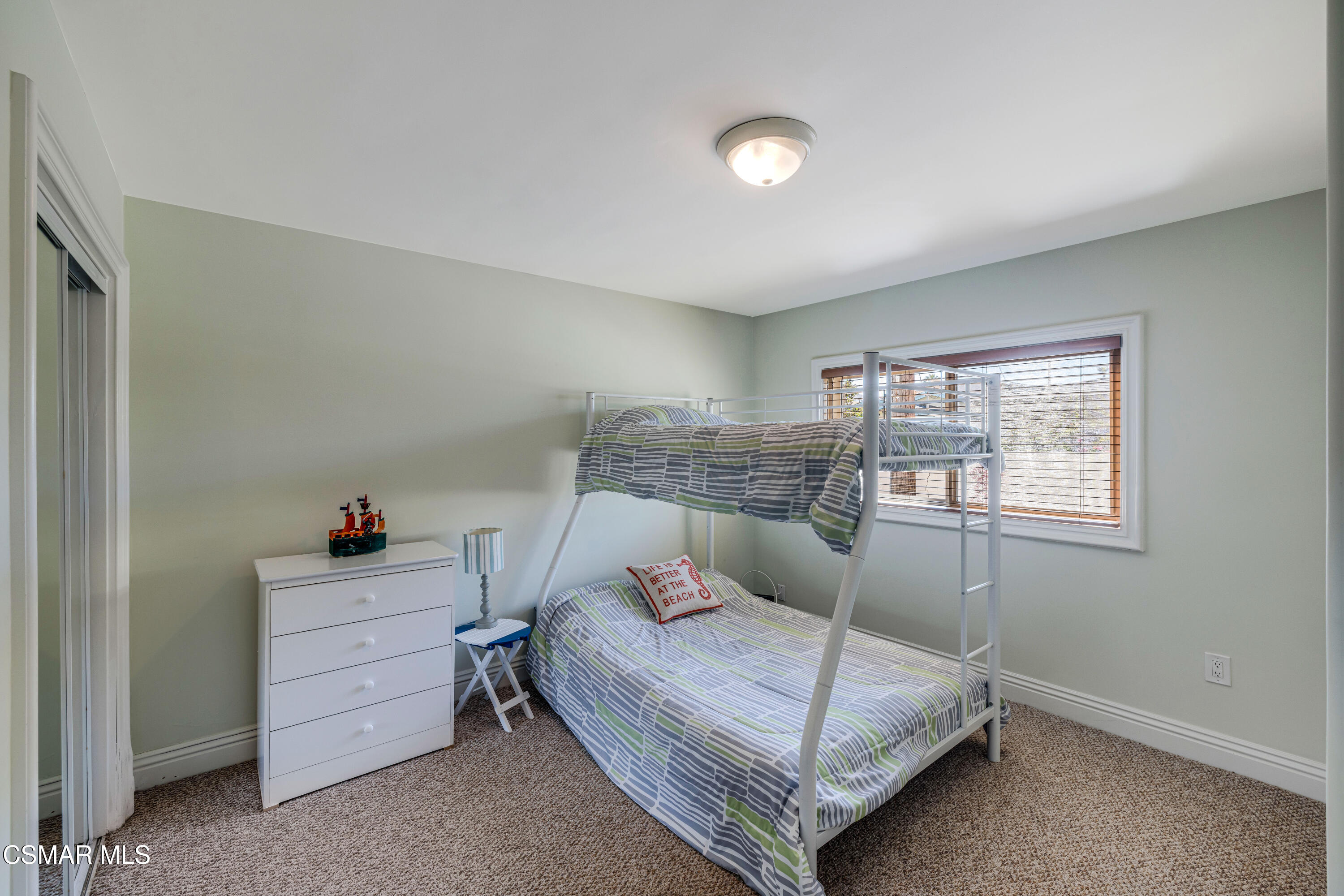 108 Pasadena Avenue Oxnard, CA 93035 - Photo 16 of 29 a bedroom with a bed and a window