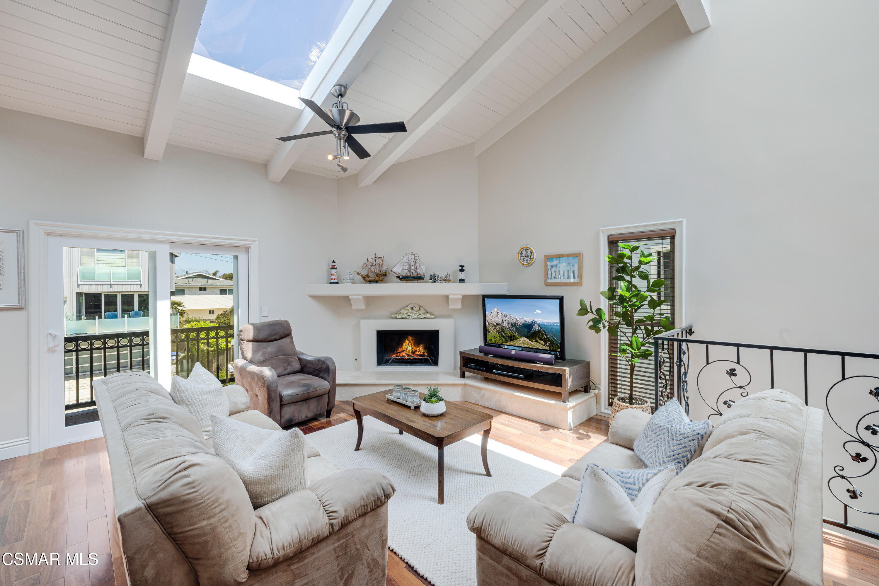 108 Pasadena Avenue Oxnard, CA 93035 - Photo 2 of 29 a living room with furniture a fireplace and a flat screen tv