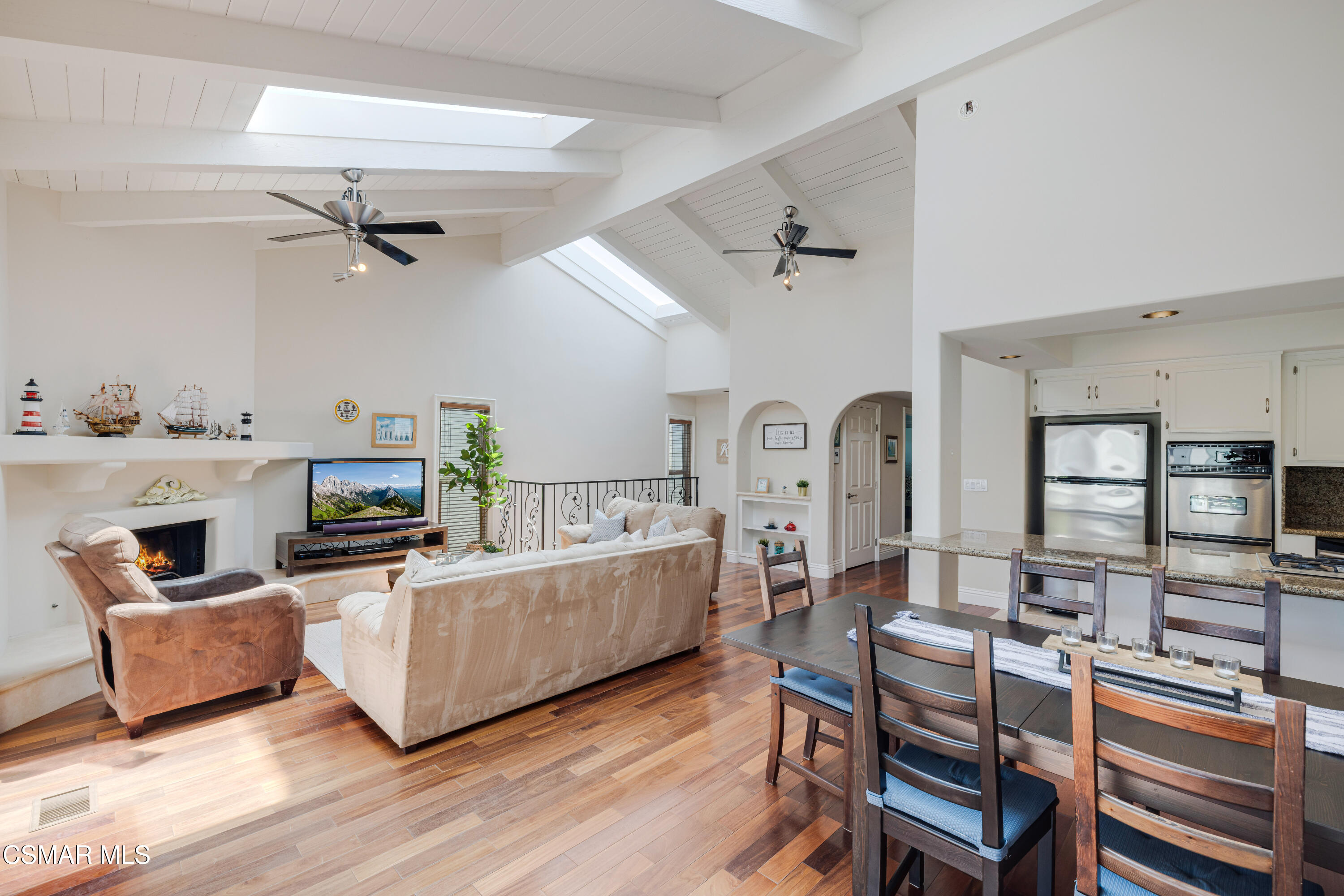 108 Pasadena Avenue Oxnard, CA 93035 - Photo 8 of 29 a living room with furniture and a fireplace
