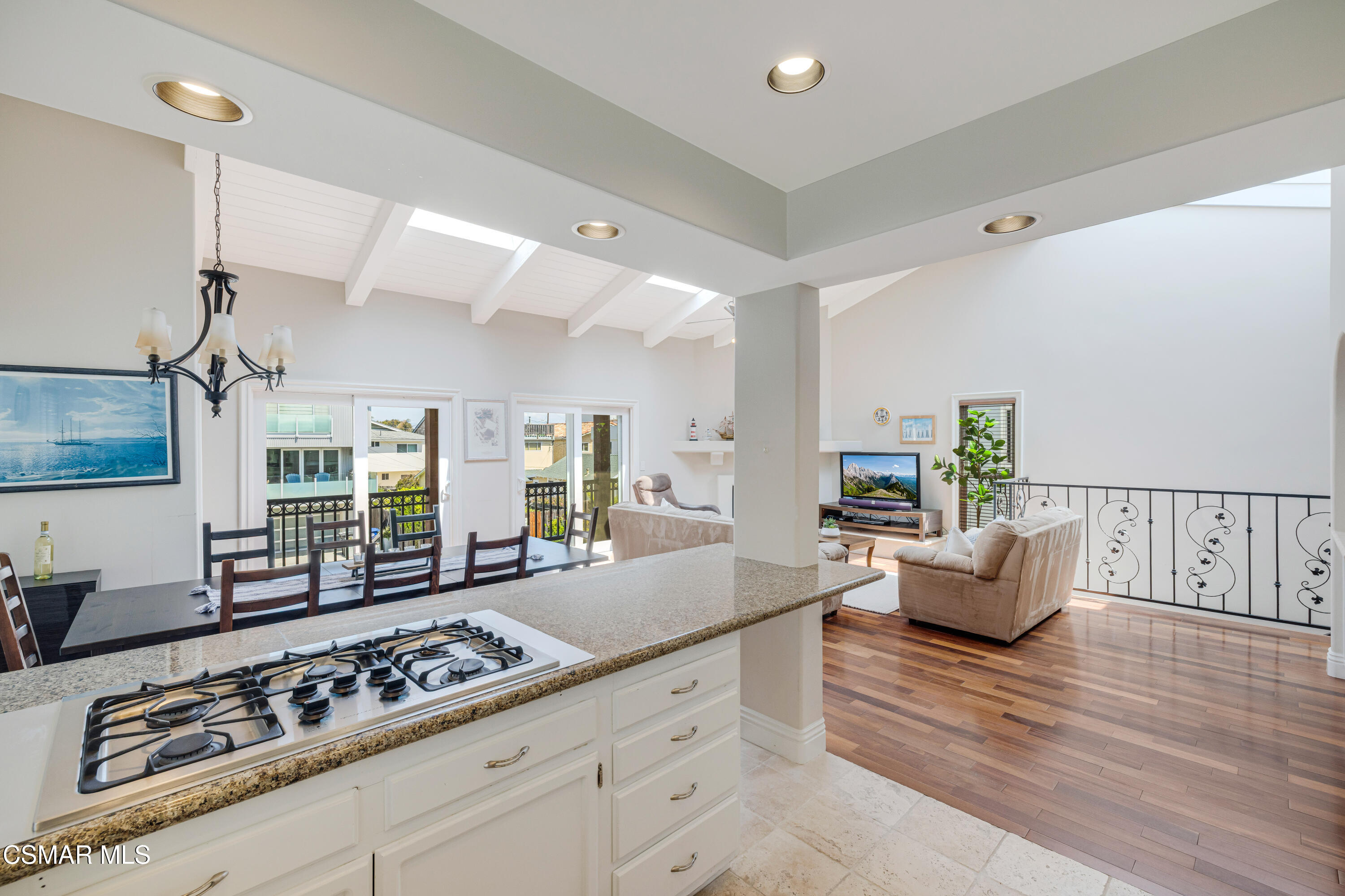 108 Pasadena Avenue Oxnard, CA 93035 - Photo 9 of 29 a large living room with stainless steel appliances furniture a rug and a large window