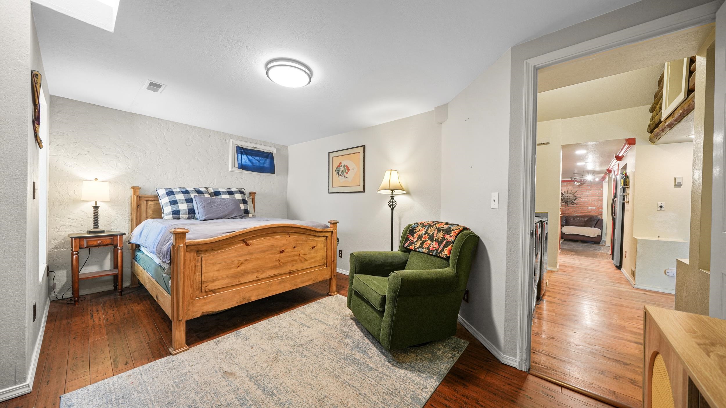 2518 D Road Grand Junction, CO 81507 - Photo 18 of 42 a bedroom with a bed and a couch