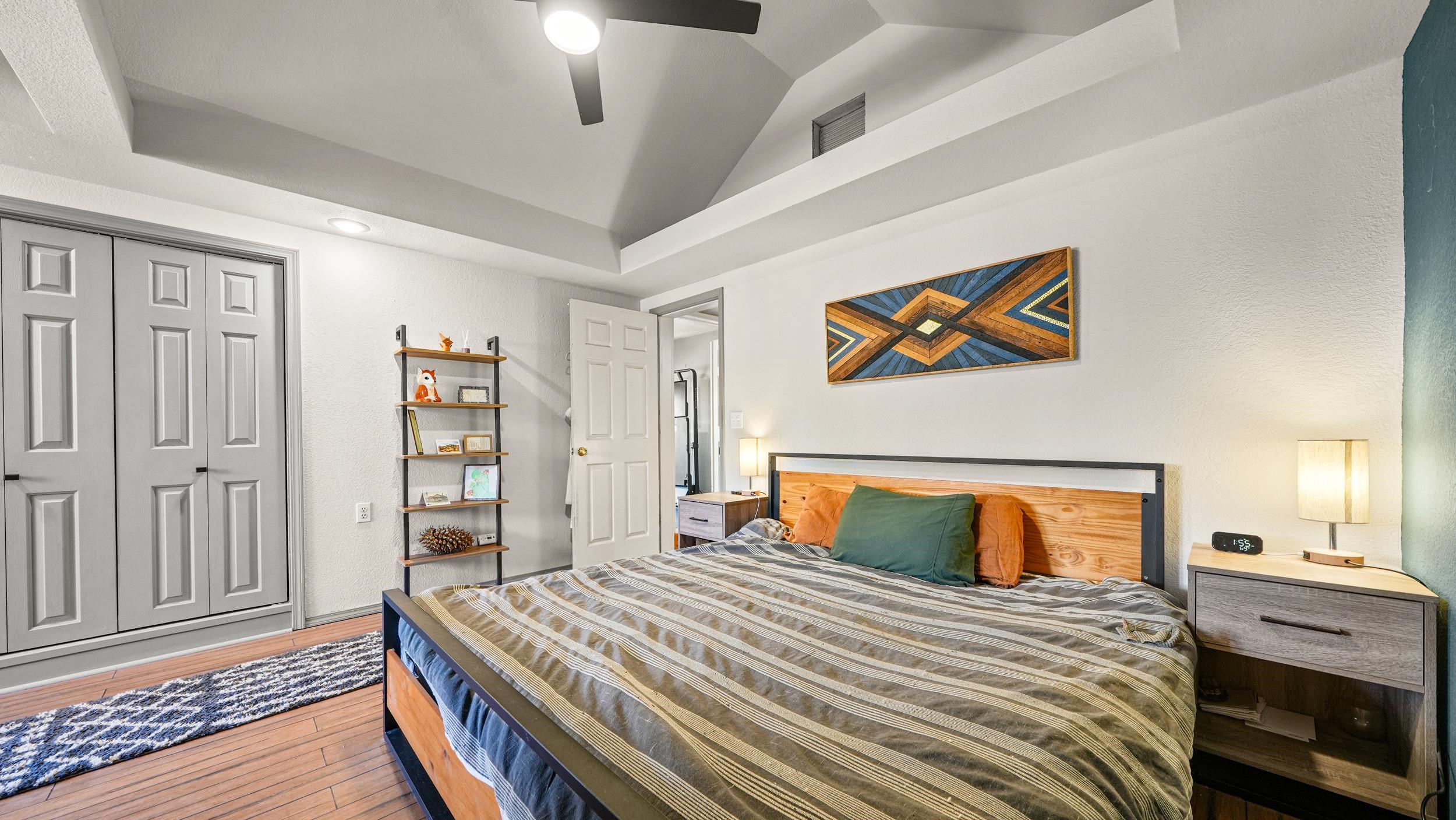 2518 D Road Grand Junction, CO 81507 - Photo 22 of 42 a bedroom with a bed and wooden floor
