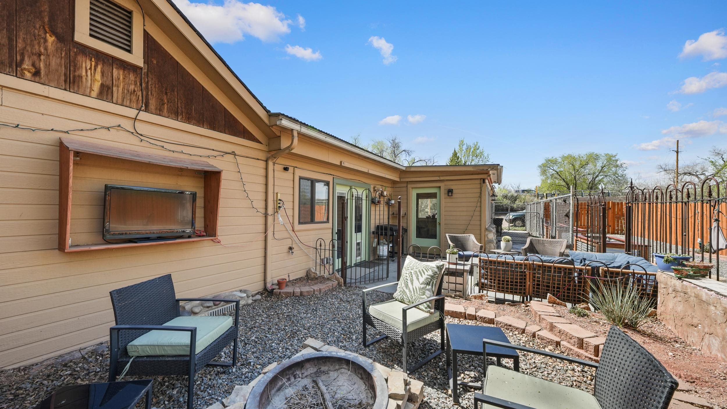 2518 D Road Grand Junction, CO 81507 - Photo 30 of 42 a view of a patio with couches table and chairs with wooden floor