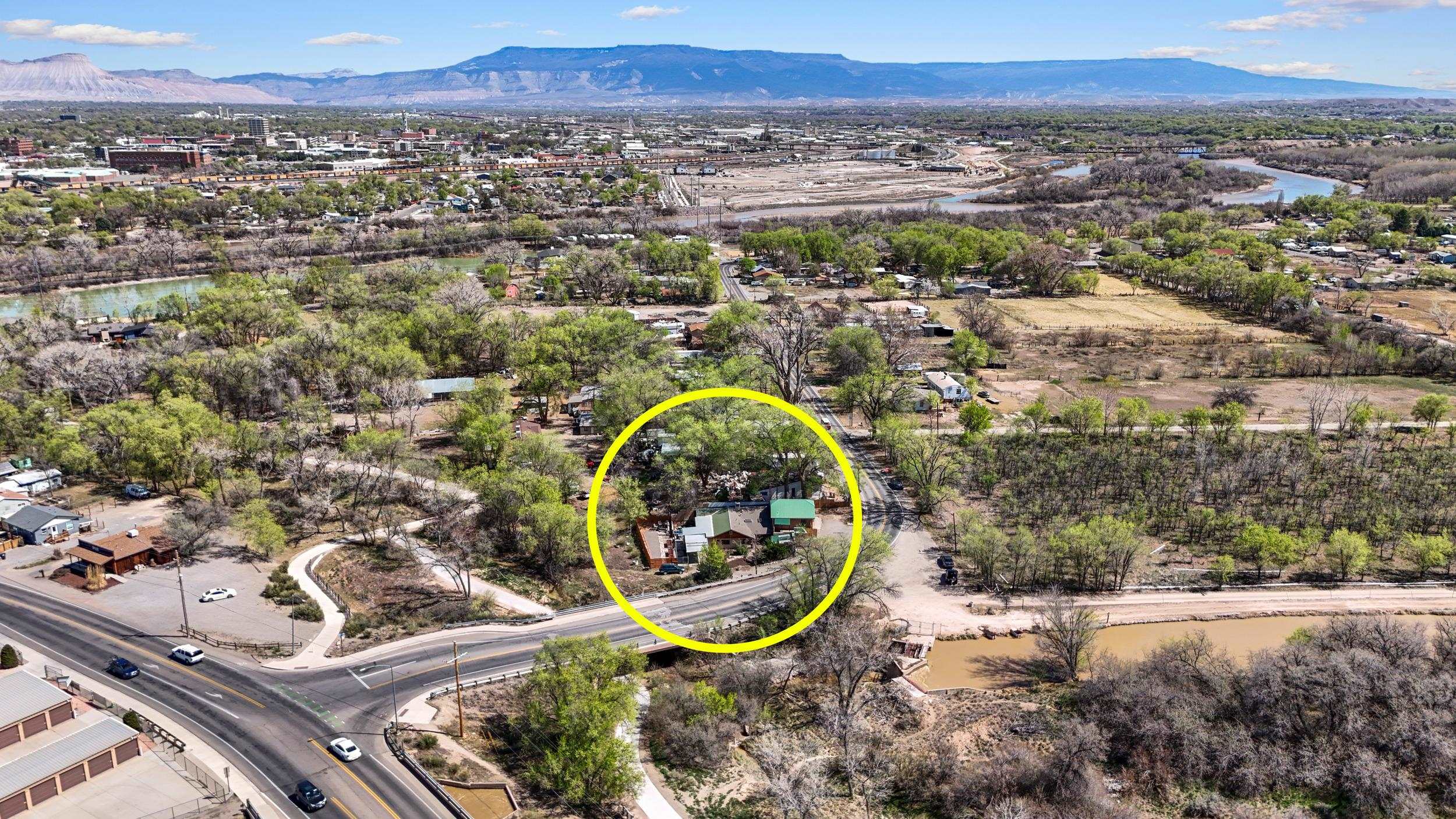 2518 D Road Grand Junction, CO 81507 - Photo 40 of 42 an aerial view of a house with a yard and lake view