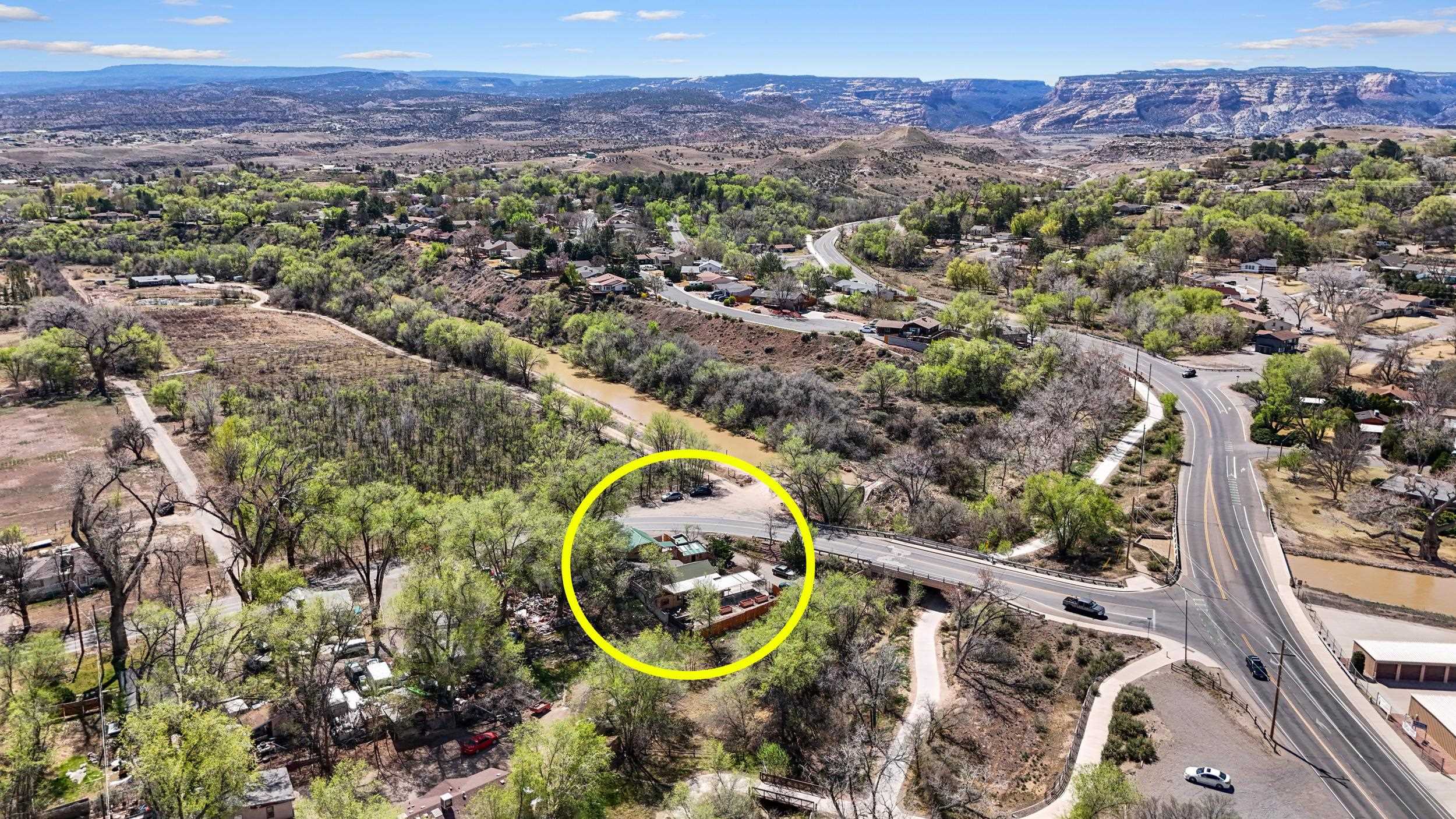 2518 D Road Grand Junction, CO 81507 - Photo 42 of 42 an aerial view of a house with a swimming pool and a garden
