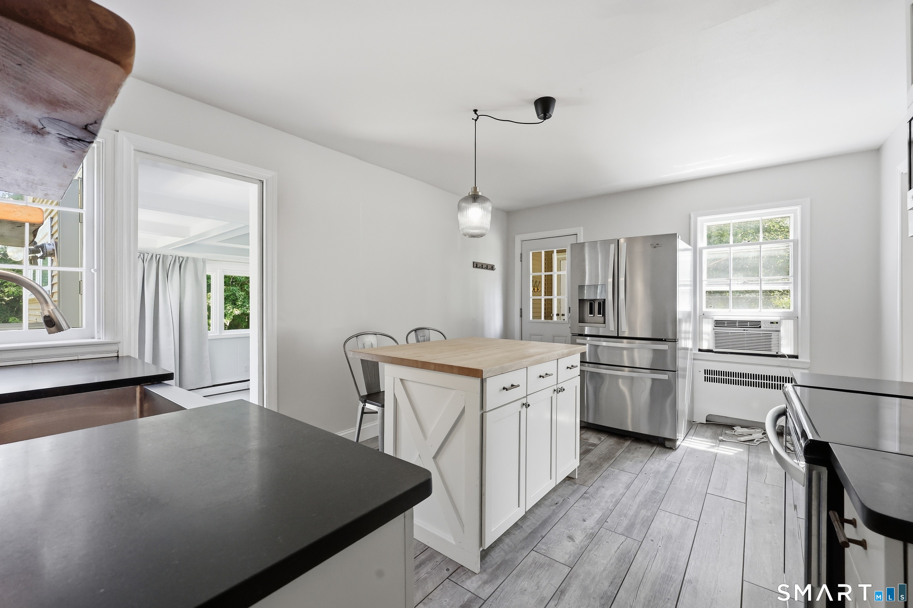 122 Overbrook Road West Hartford, CT 06107 - Photo 5 of 23 Updated kitchen with subway tile, stainless appliances and a butcher-block island!