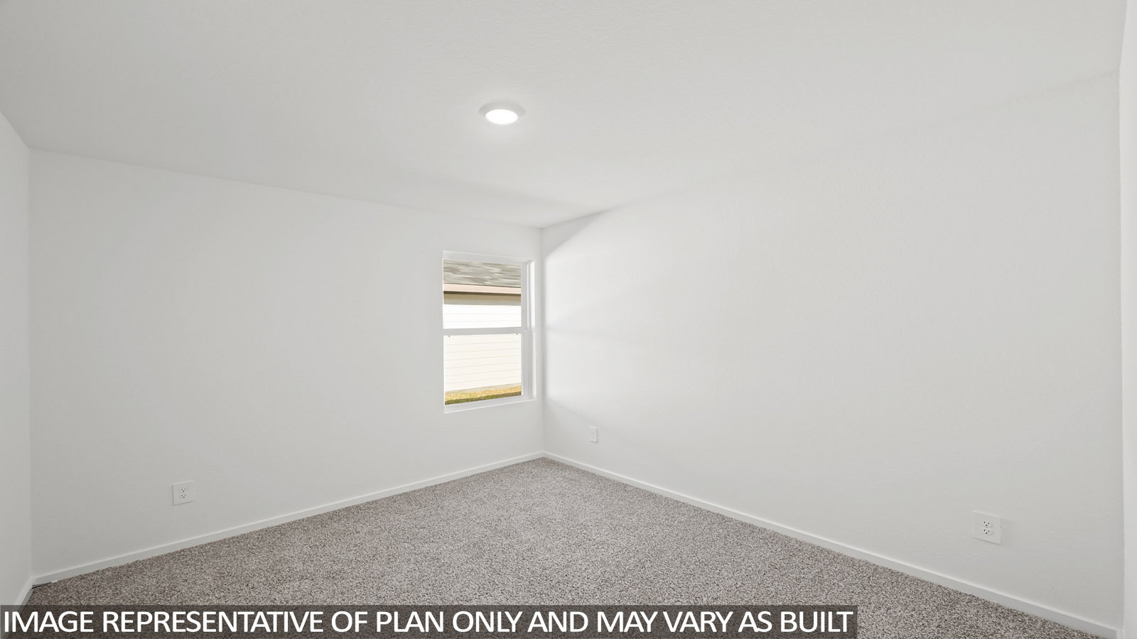 165 Baby Calf Roping Road Jarrell, TX 76537 - Photo 17 of 24 A well-lit bedroom features plush carpeting and a sun-filled corner window.
