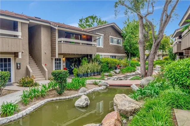 a view of a house with swimming pool