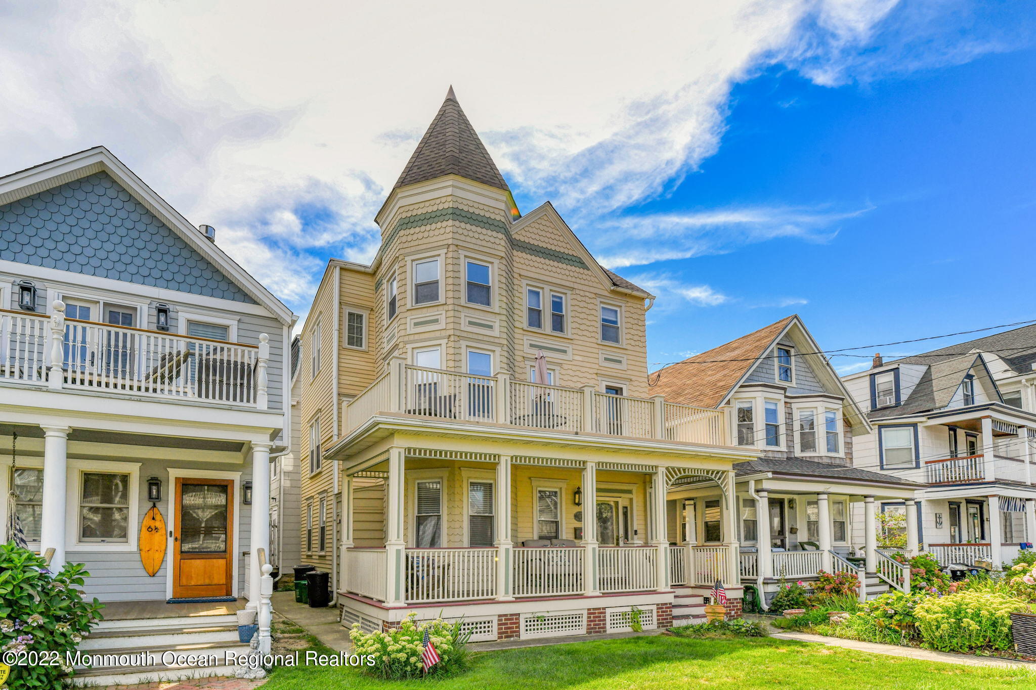 8 Surf Avenue, Unit 1 Ocean Grove, NJ 07756 - Photo 2 of 28 a view of a big yard with large windows and a yard