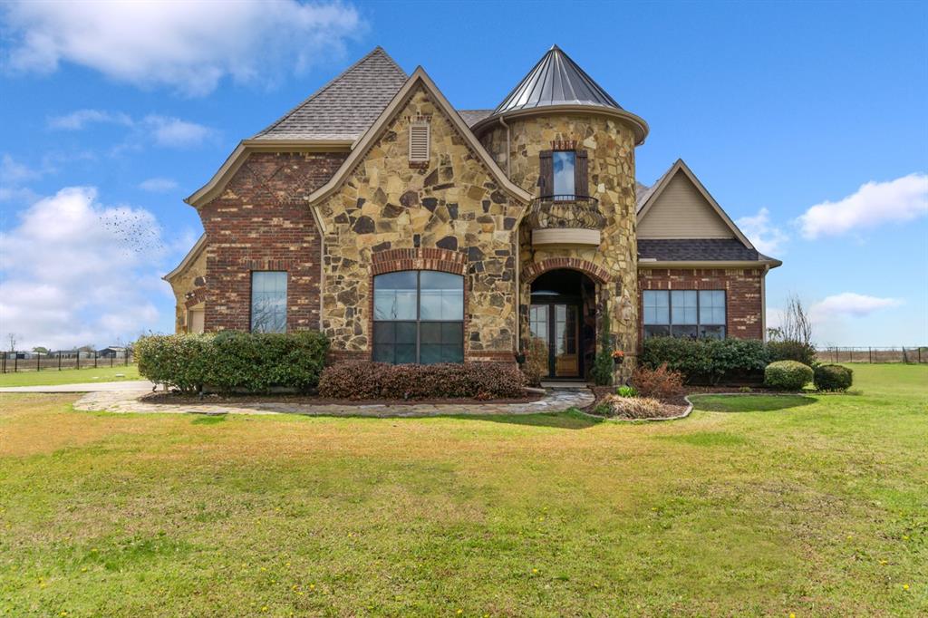 a front view of house with yard