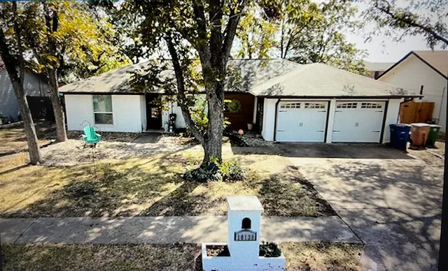 a view of a house with snow in the yard