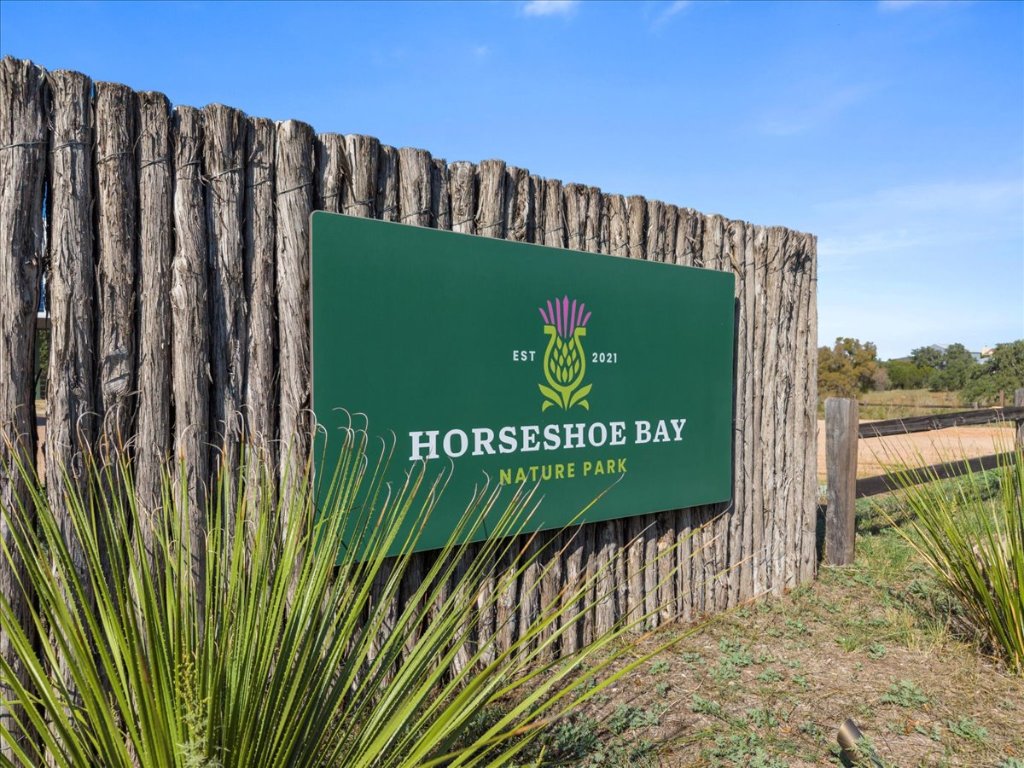 102 Mountain Home Road Horseshoe Bay, TX 78657 - Photo 25 of 32 a view of a sign in a park