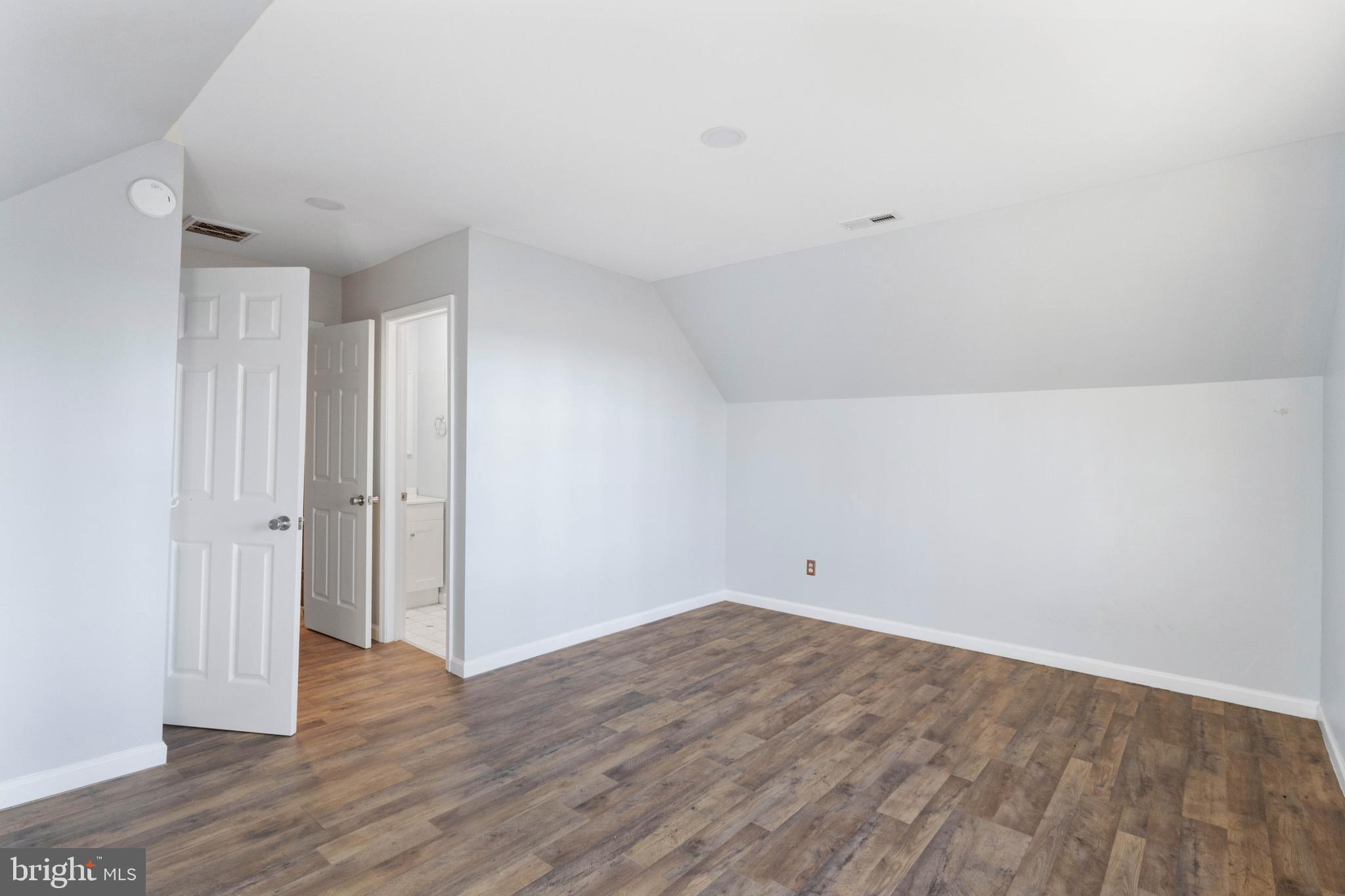 19268 Deerfield Road Bridgeville, DE 19933 - Photo 18 of 33 a view of an empty room with wooden floor