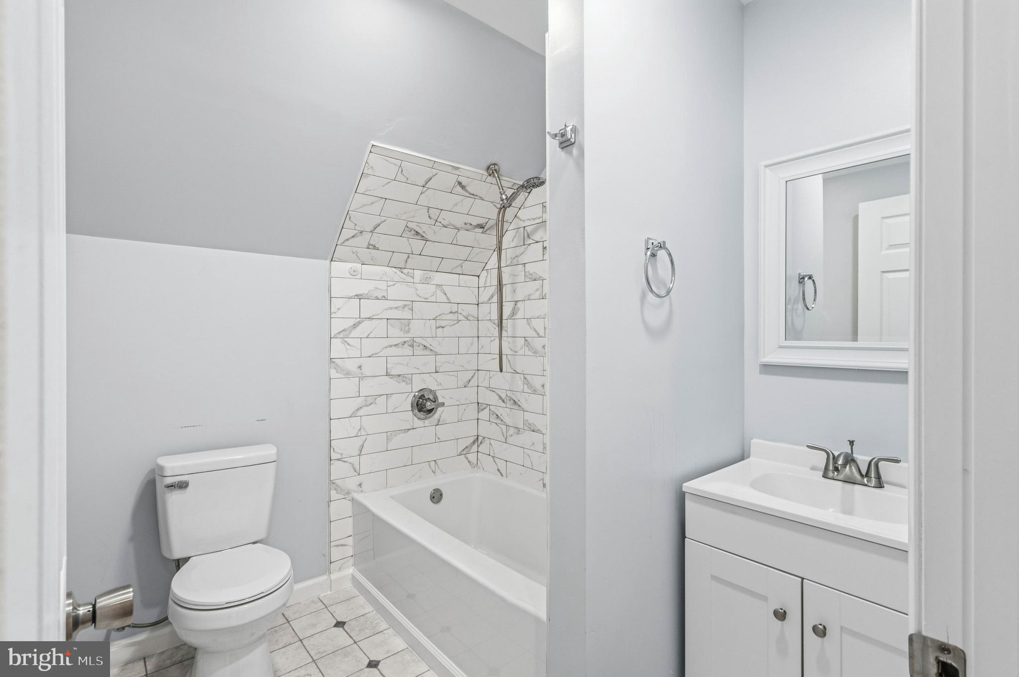 19268 Deerfield Road Bridgeville, DE 19933 - Photo 22 of 33 a bathroom with a sink a toilet and shower