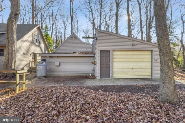 a view of an empty room with windows