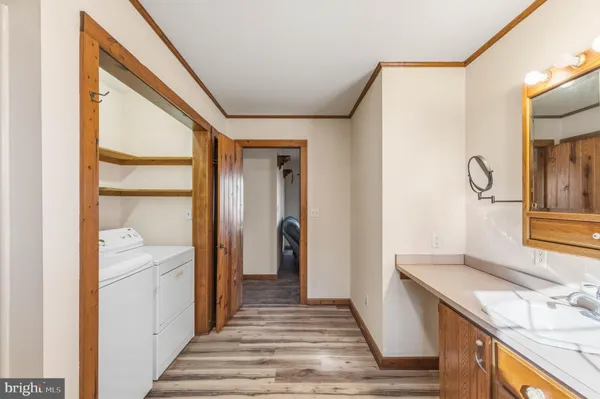 a view of a bathroom from the hallway