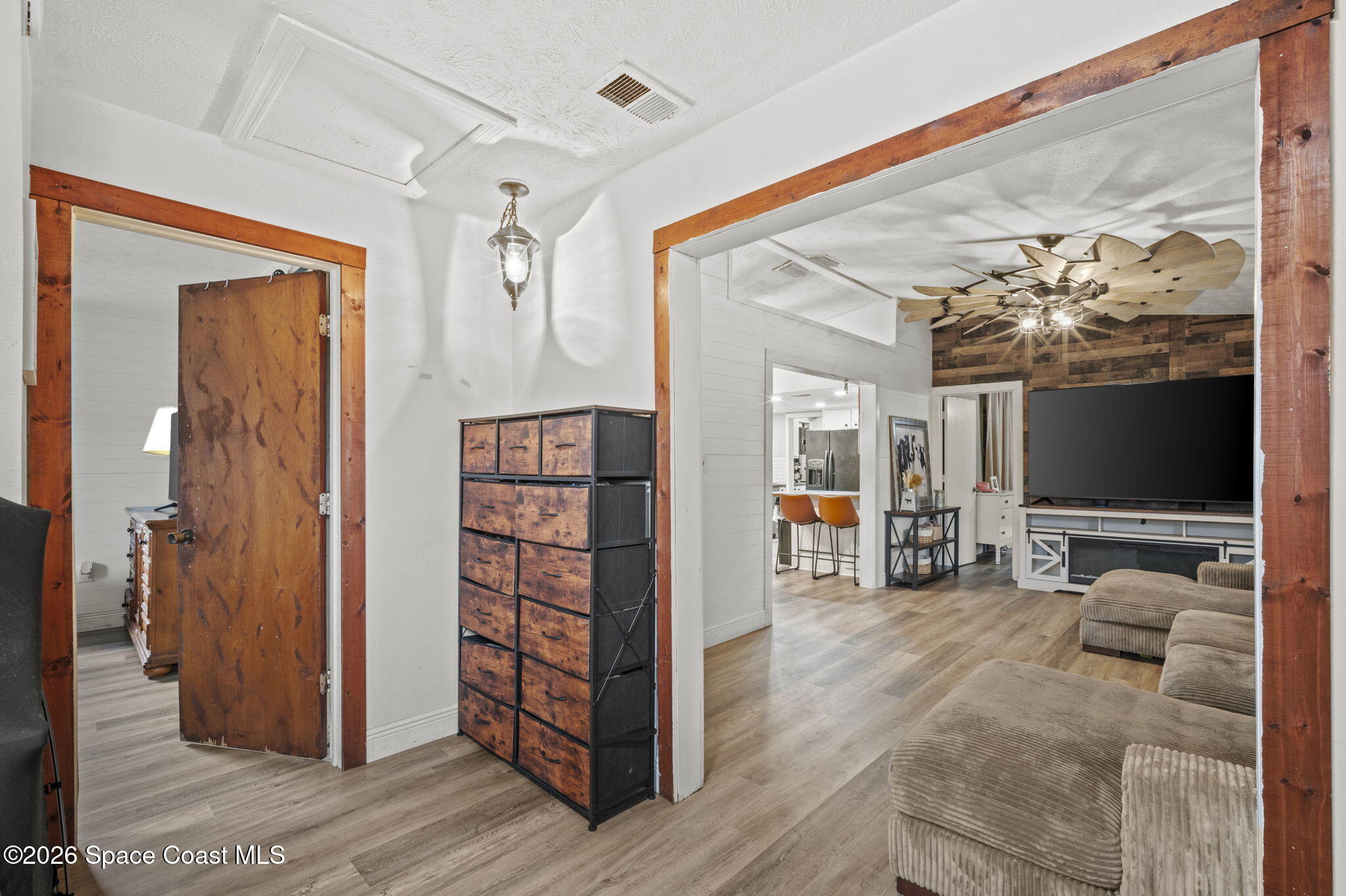 3416 Flounder Creek Road Mims, FL 32754 - Photo 19 of 42 a view of a livingroom with furniture and window