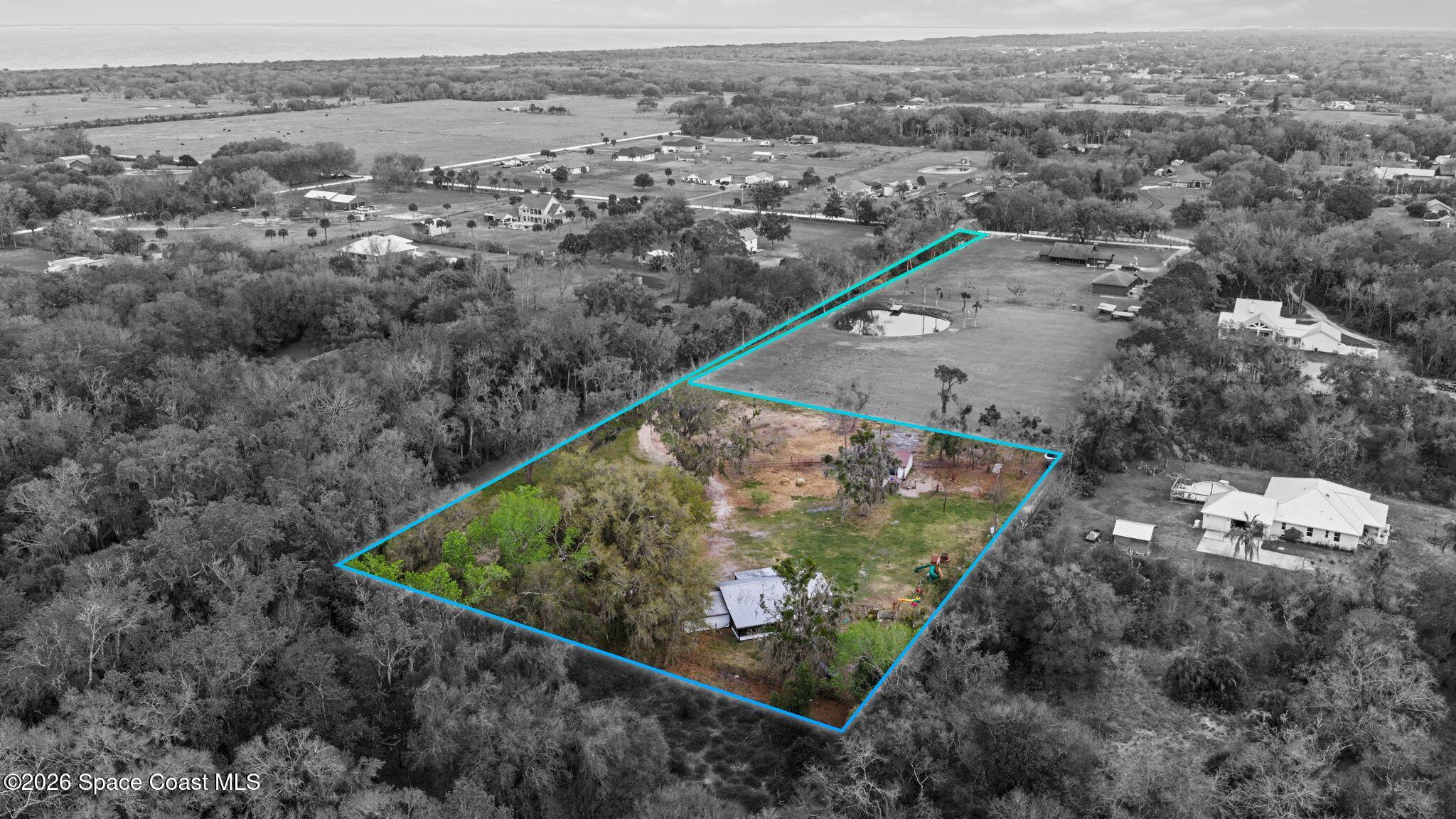 3416 Flounder Creek Road Mims, FL 32754 - Photo 2 of 42 an aerial view of a house