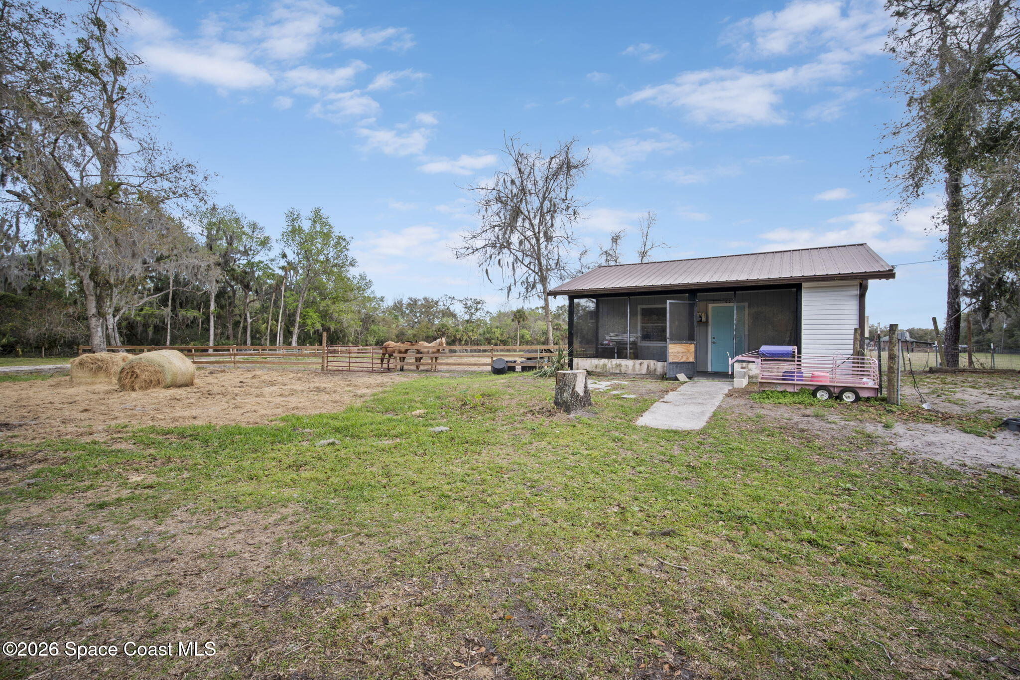 3416 Flounder Creek Road Mims, FL 32754 - Photo 31 of 42 a view of a park with swings and slides
