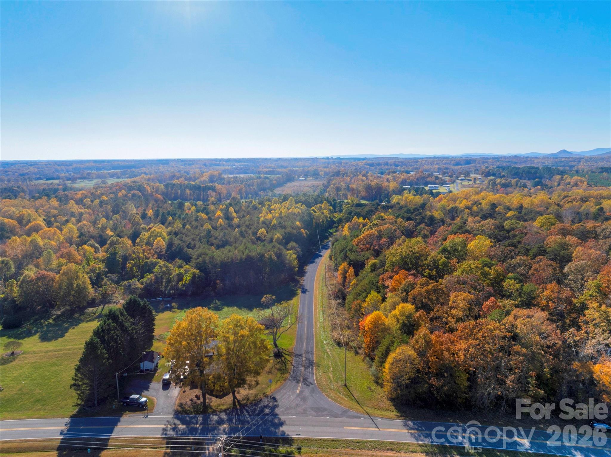 0 Bud Davis Road, Unit 9 Vale, NC 28168 - Photo 2 of 23 a view of a city with mountains in the background