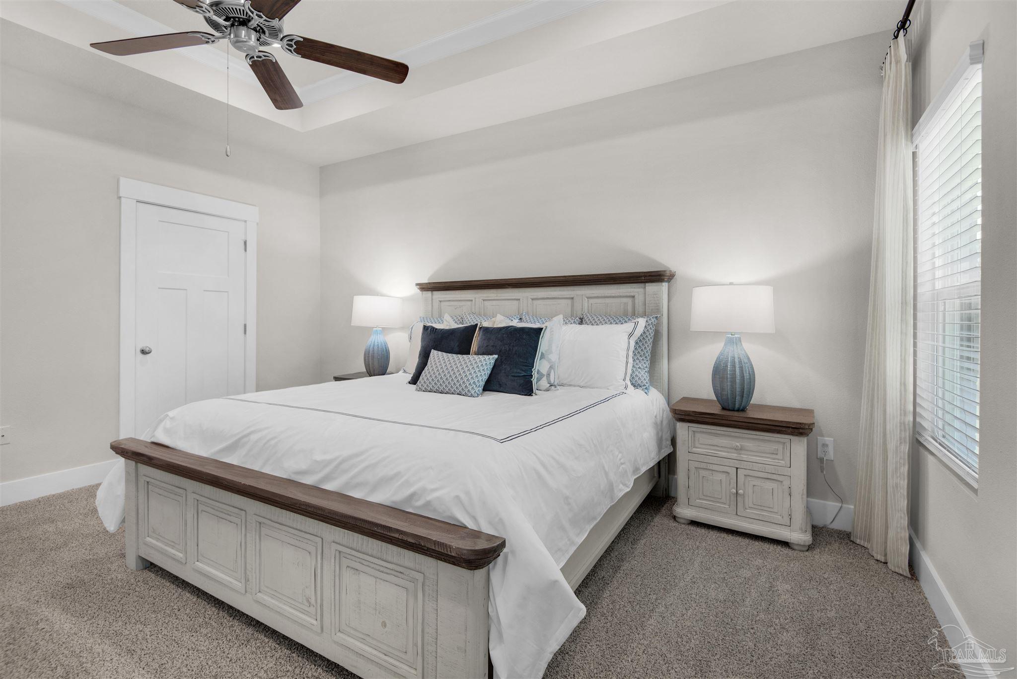 3411 Crossvine Road Cantonment, FL 32533 - Photo 33 of 45 a bedroom with a bed and window