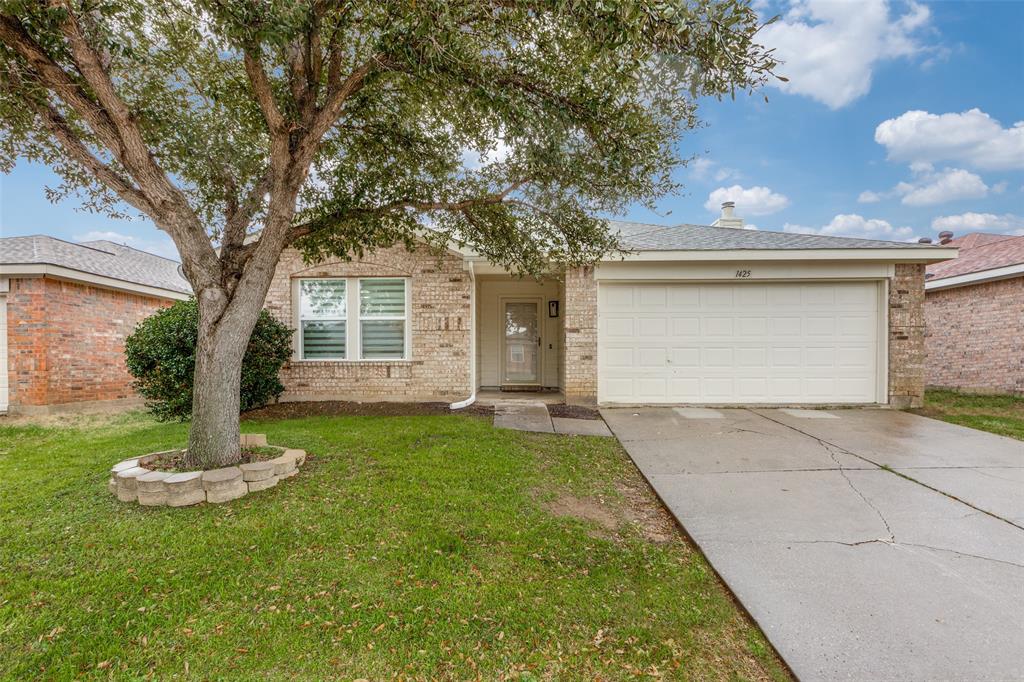 1425 Ridgecrest Drive Little Elm, TX 75068 - Photo 2 of 27 a front view of a house with a yard