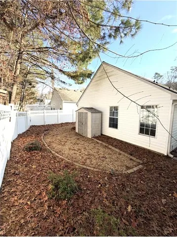 a house view with a backyard