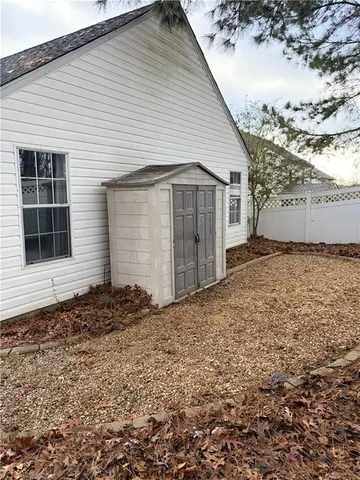 a house view with a backyard