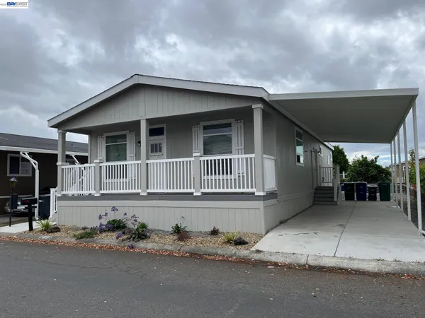 a house view with a outdoor space