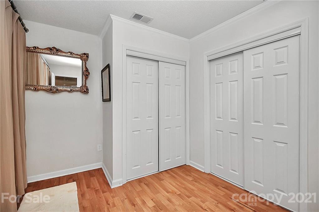 16844 Timber Crossing Road, Unit 2111 Charlotte, NC 28213 - Photo 29 of 33 a view of empty room