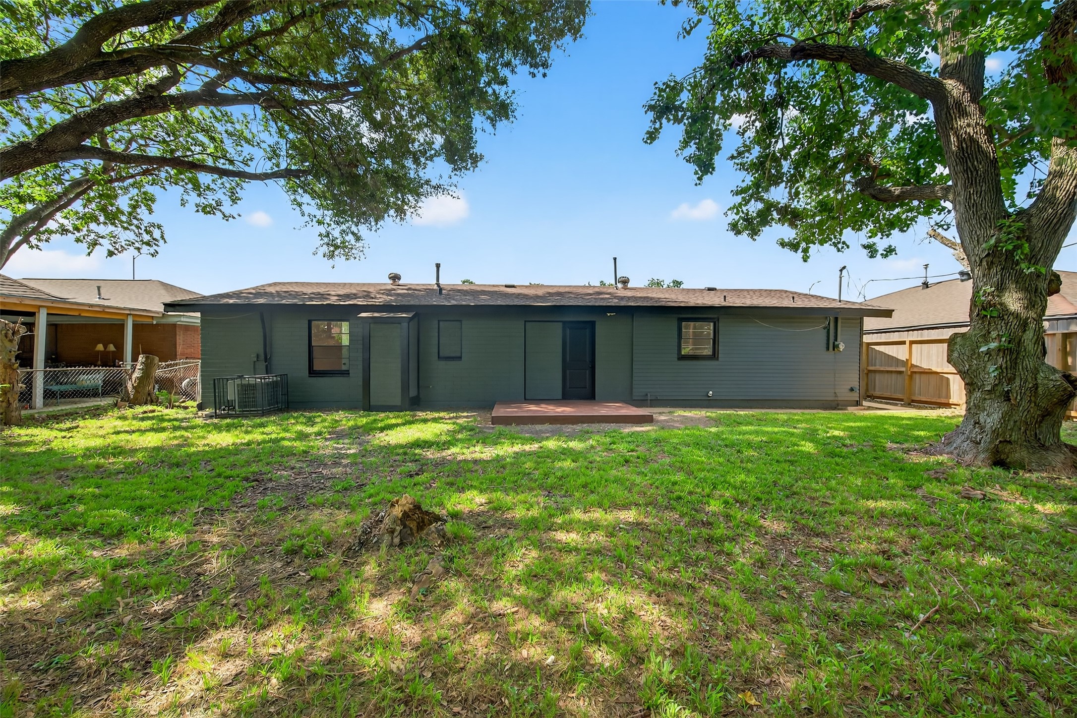 4310 Jorns Street Houston, TX 77045 - Photo 26 of 28 Spacious backyard with patio deck