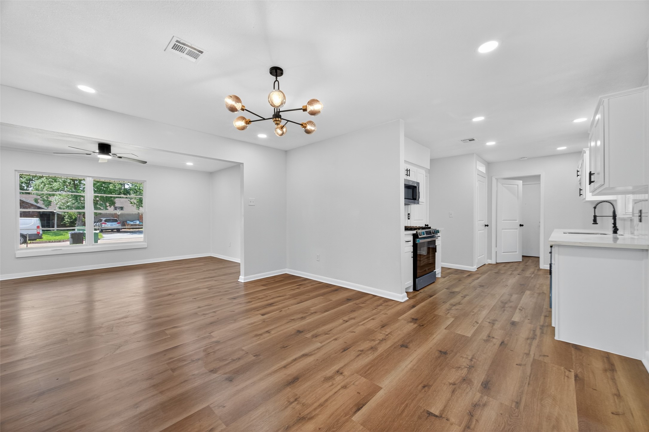 4310 Jorns Street Houston, TX 77045 - Photo 8 of 28 Open Concept Family-Kitchen-Dining Room
