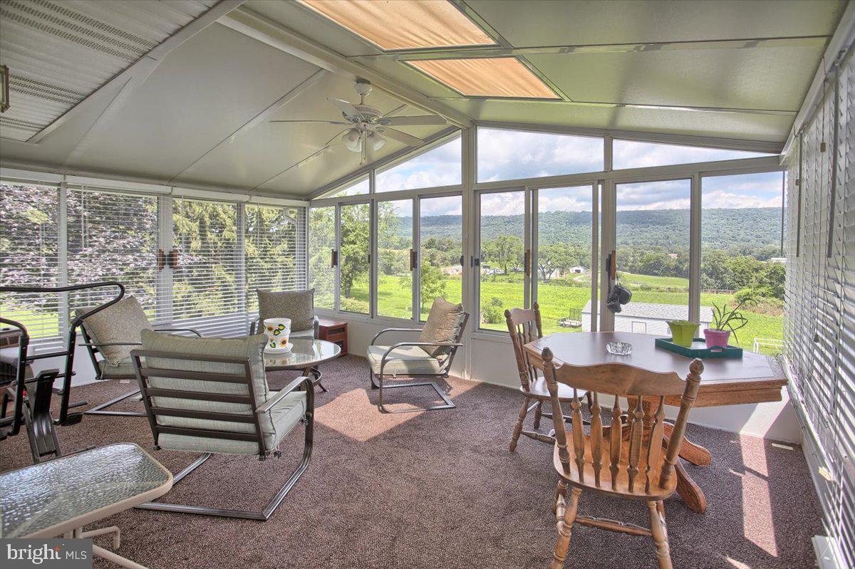 1327 Ridge Road Grantville, PA 17028 - Photo 13 of 42 Conditioned sunroom adds living space w/a view!
