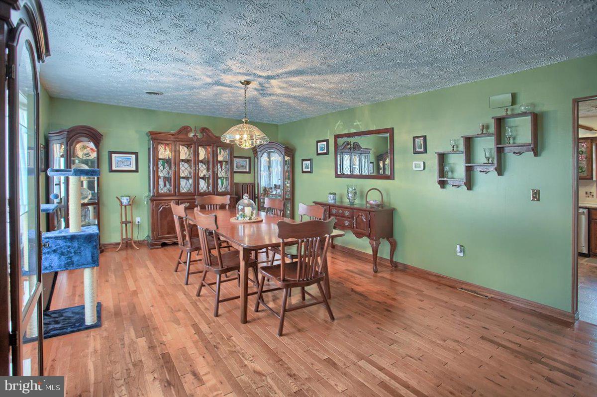 1327 Ridge Road Grantville, PA 17028 - Photo 5 of 42 Spacious dining room w/durable hardwood floors
