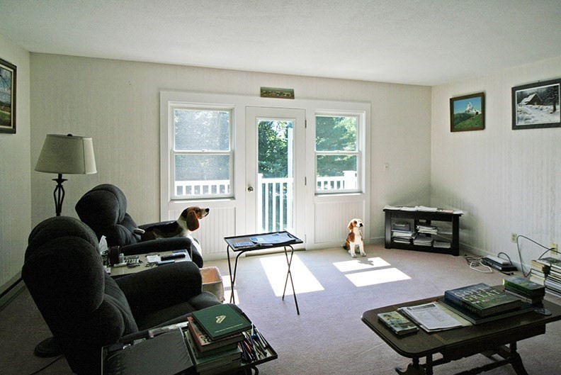 48 Evergreen Road, Unit 306 Northampton, MA 01053 - Photo 2 of 9 a room with furniture and a window