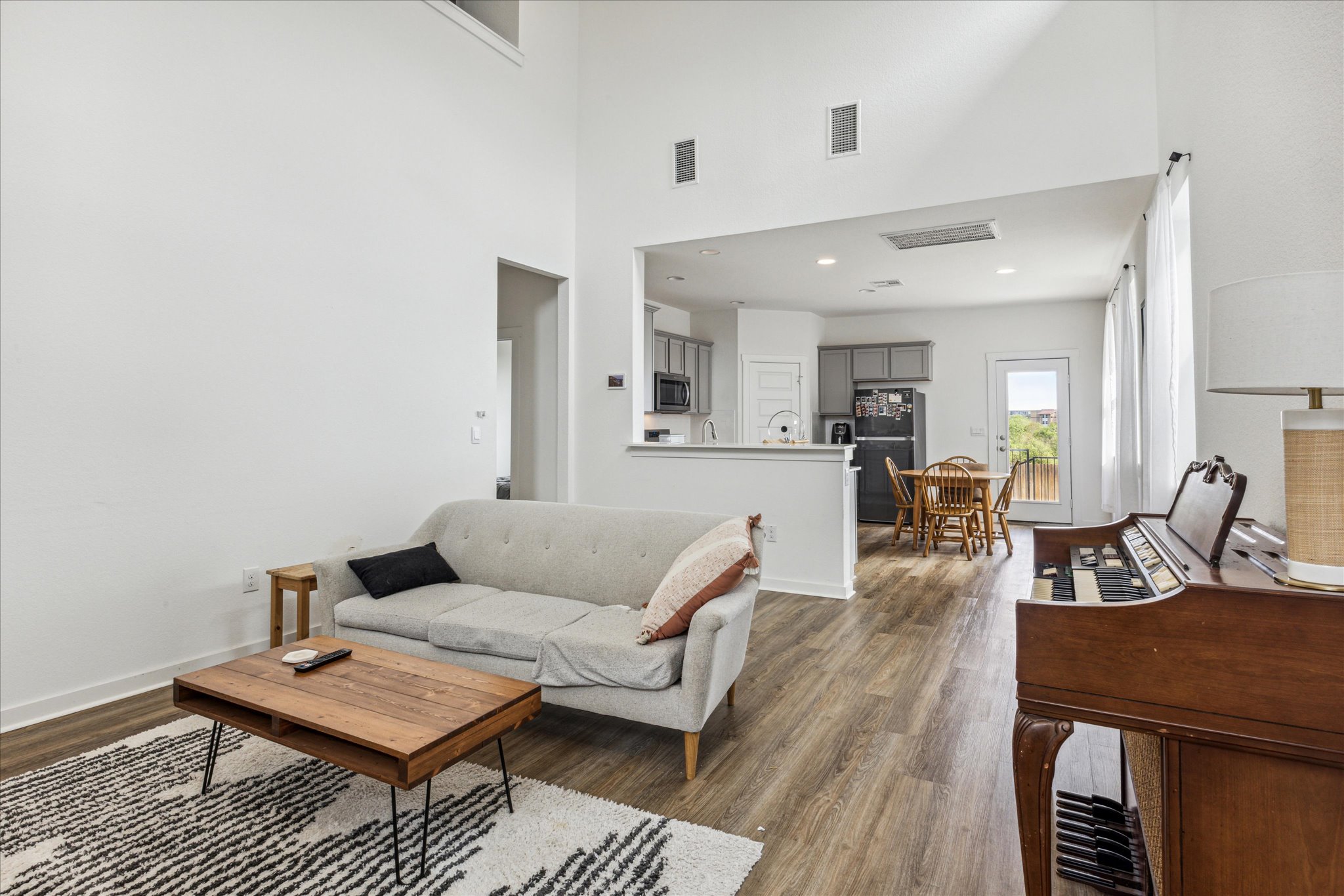 7916 Linnie Lane Austin, TX 78724 - Photo 2 of 14 a living room with furniture and wooden floor