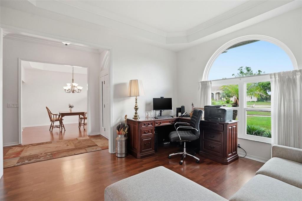 14228 Presteign Lane Spring Hill, FL 34609 - Photo 39 of 89 a view of a livingroom with workspace and a window
