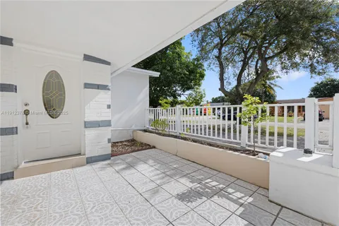 a view of a deck with a backyard