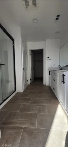 a view of a kitchen with a sink